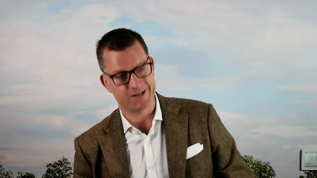 Chris Underwood speaking to camera in the clip: Why Adastrum writes its own brief