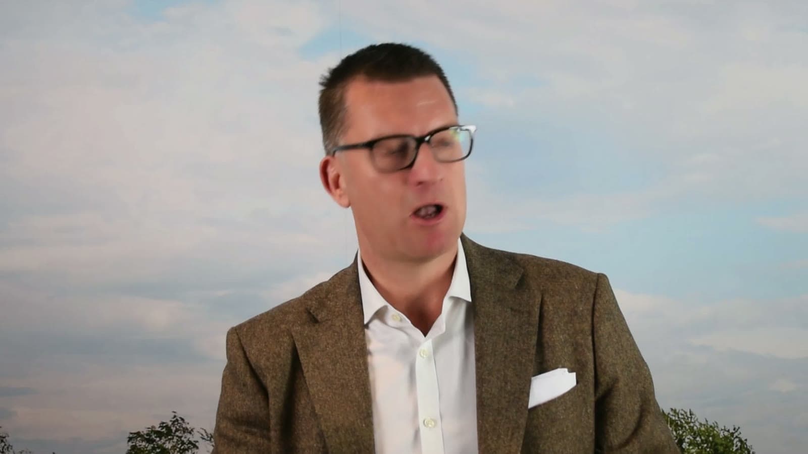 Chris Underwood, Managing Director of Adastrum Consulting, speaking to camera in the promo film