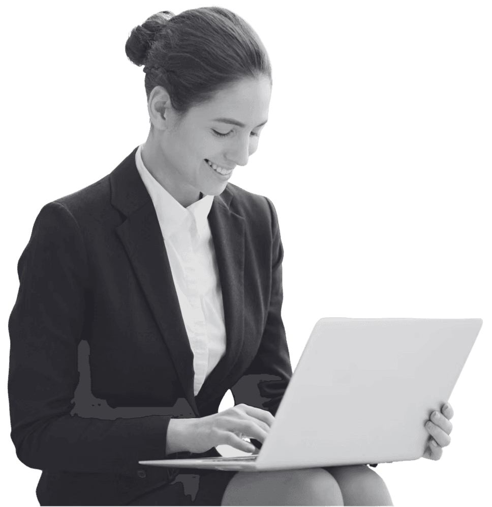 An executive search consultant working at a laptop on her lap