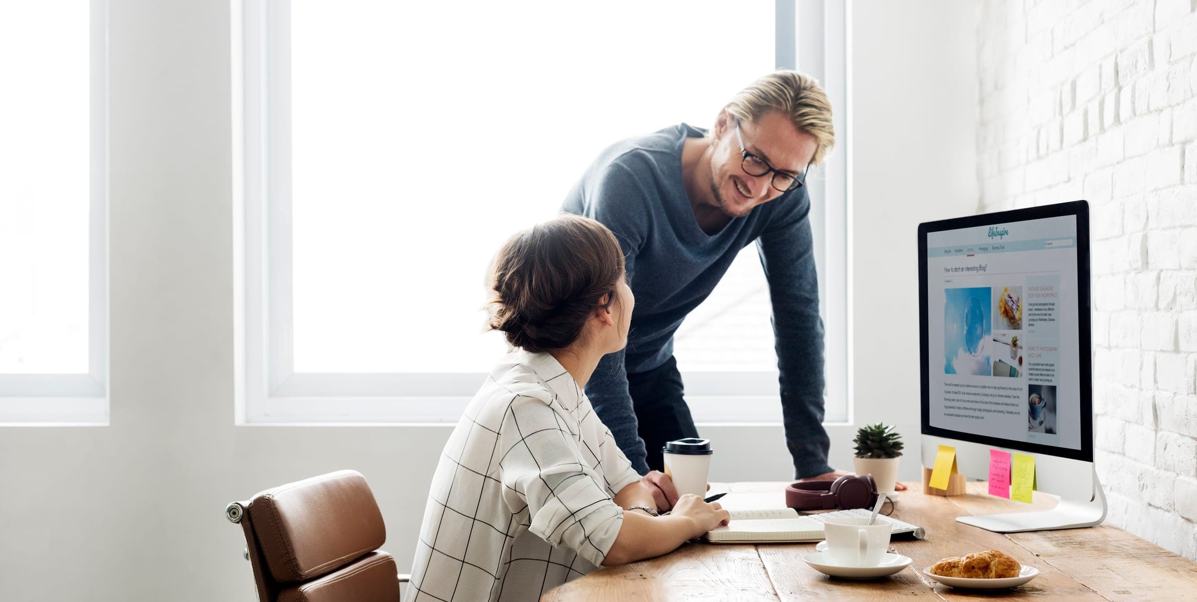 A senior talent solutions team reviewing an enterprise hiring programme