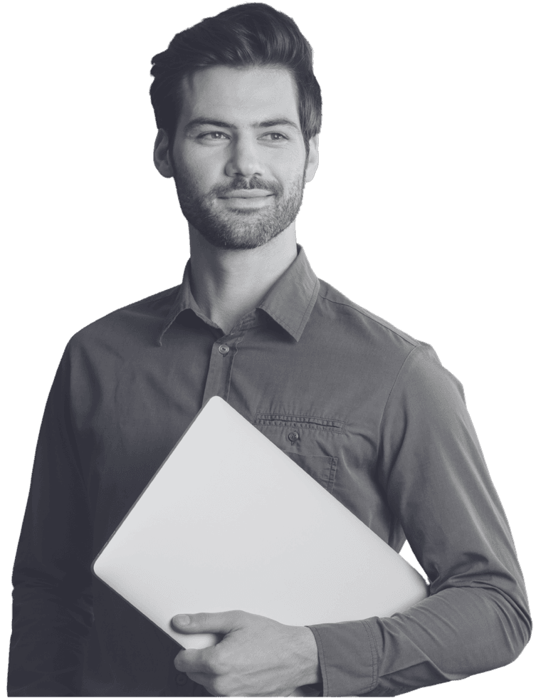A brand consultant holding a laptop under his arm